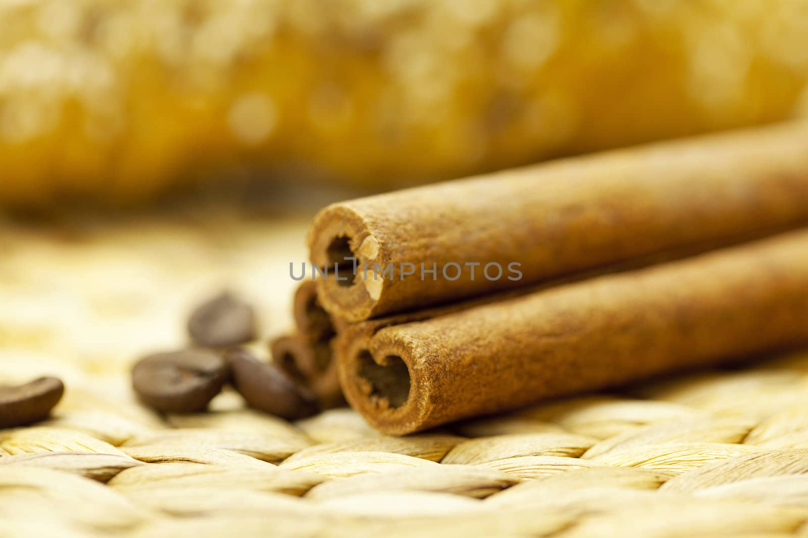 bread with seeds and cinnamon in a wicker mat by jannyjus