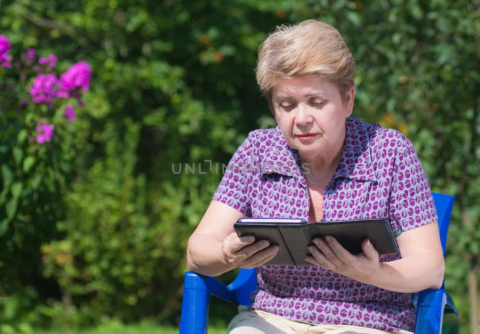 A woman with an e-book