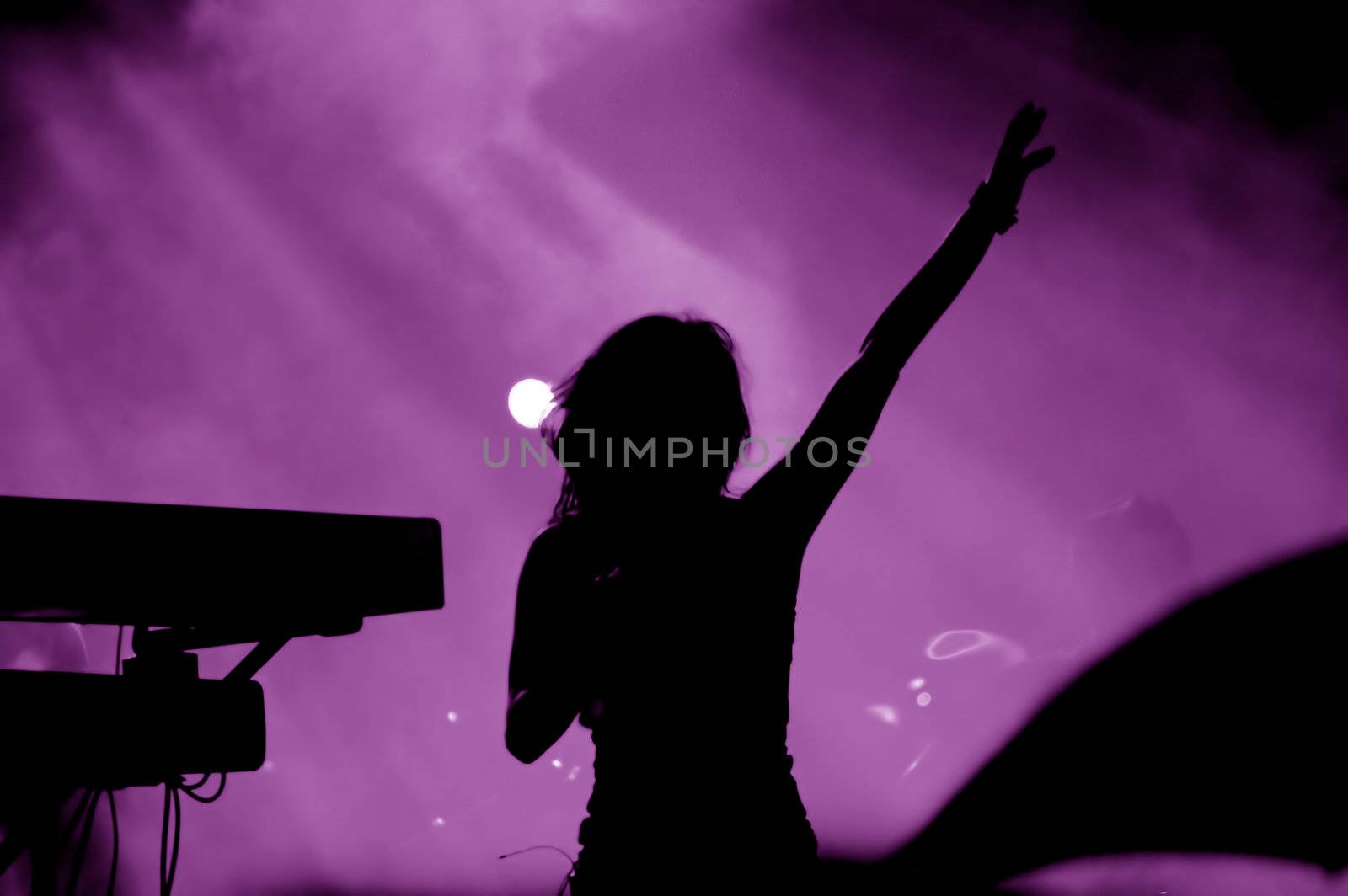 Band giving concert. Backlight image