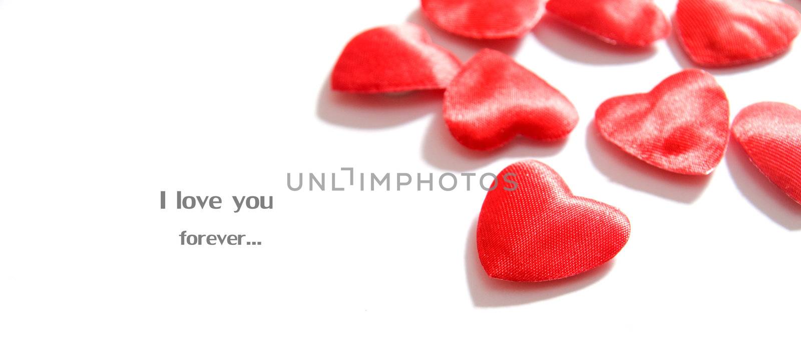 Small hearts on white background. Composition for themes like love, valentine's day, holidays.