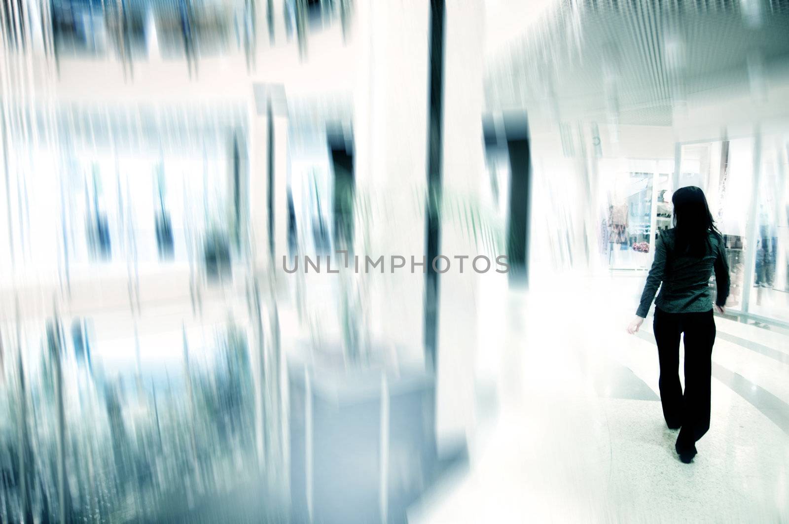 Businesswoman in rush, business center