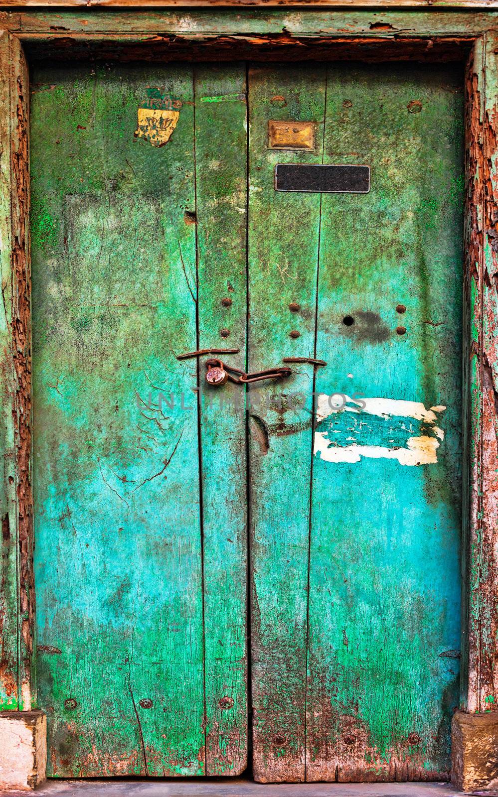 Old dilapidated wooden door. Rajasthan, India