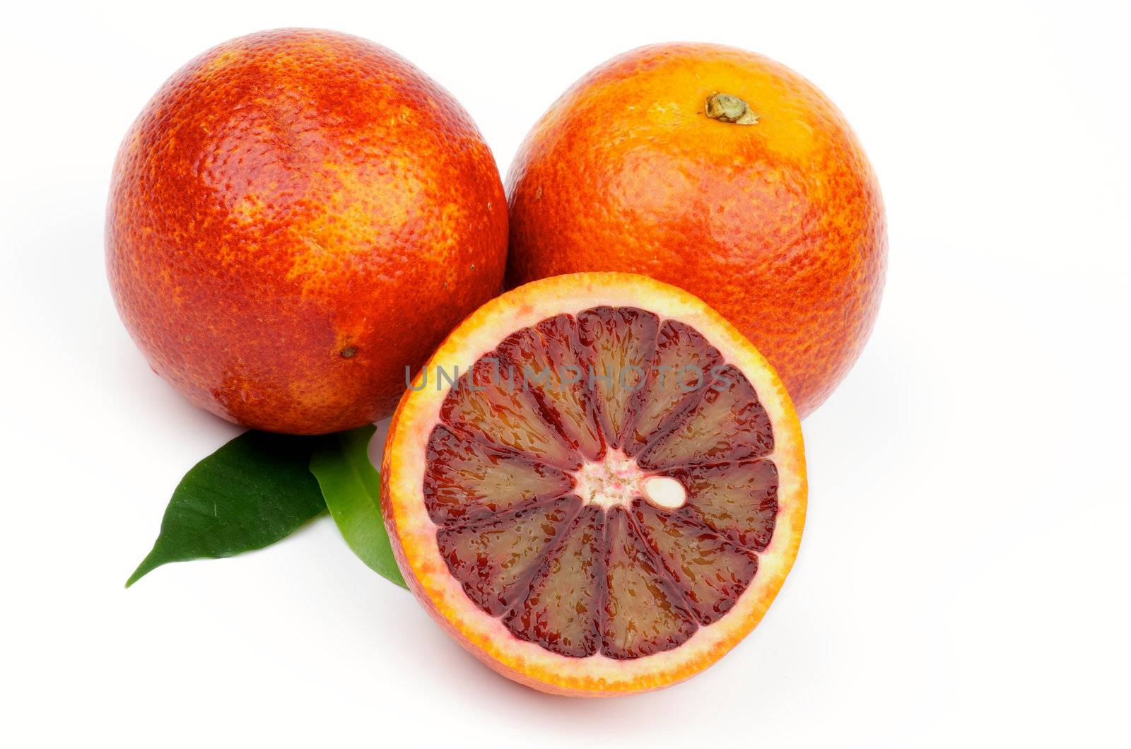 Two Full Body and Half of Blood Oranges isolated on white background
