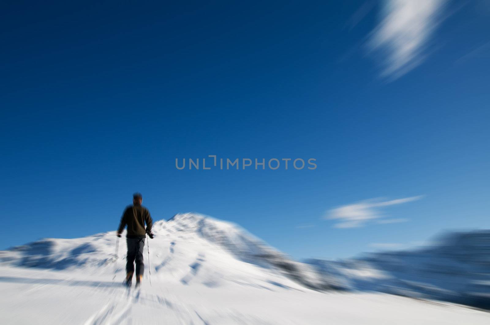 Winter sports - mountain climbing. Motion blurred