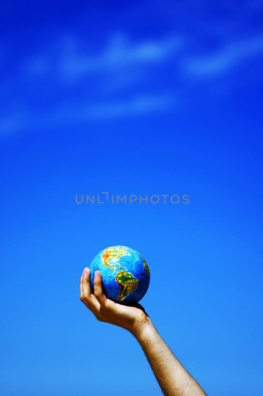 Earth globe in hand protected. Ideal for Earth protection concepts, recycling, world issues, enviroment themes