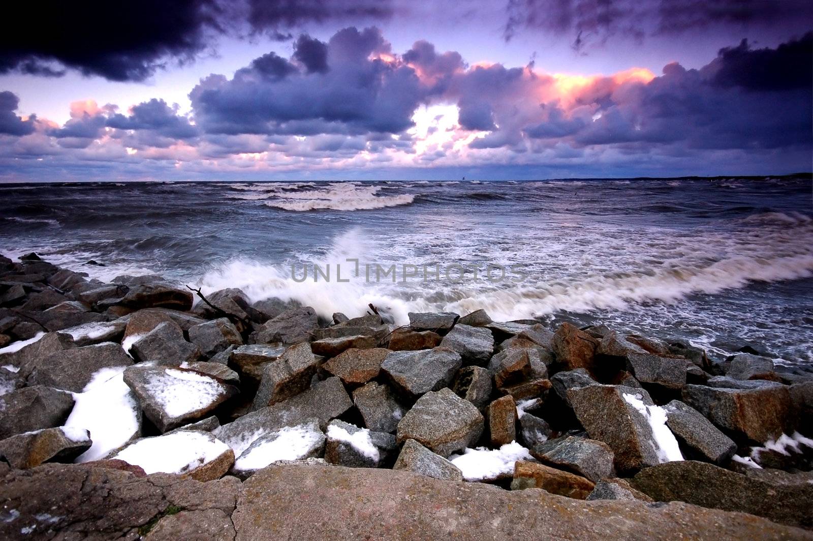 Sunset ocean and winter storm.