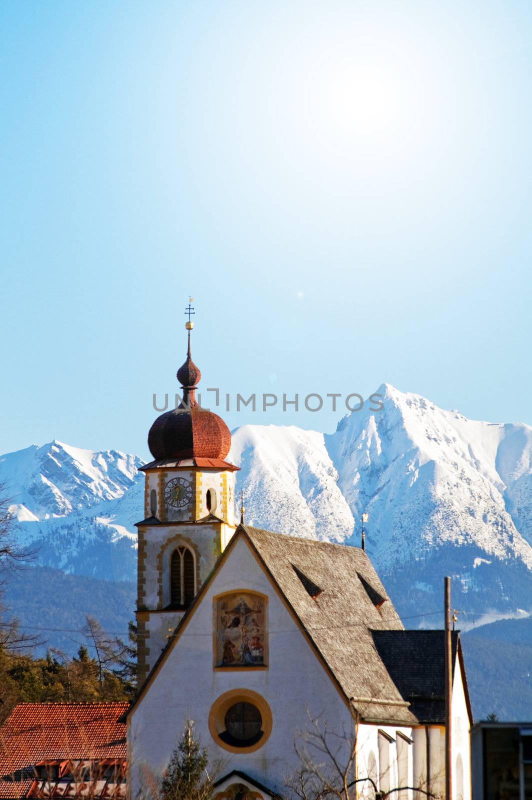 Church in alpine winter scenery