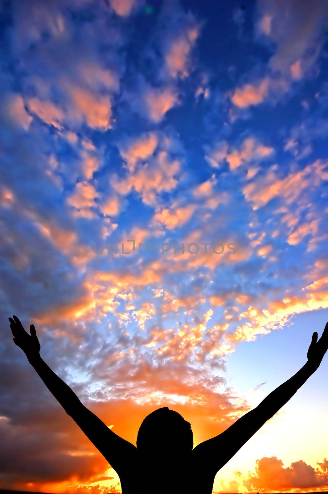 Hands up to the sky showing happiness by photocreo