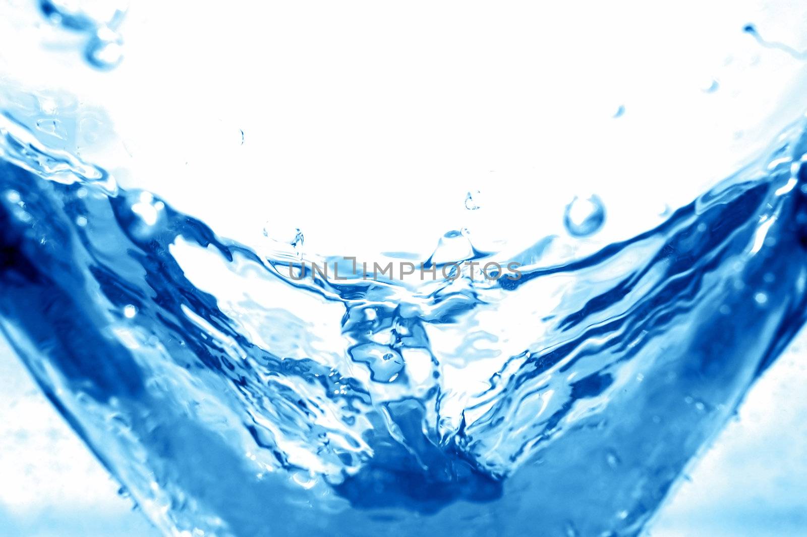 Blue water splash. Refreshing power
