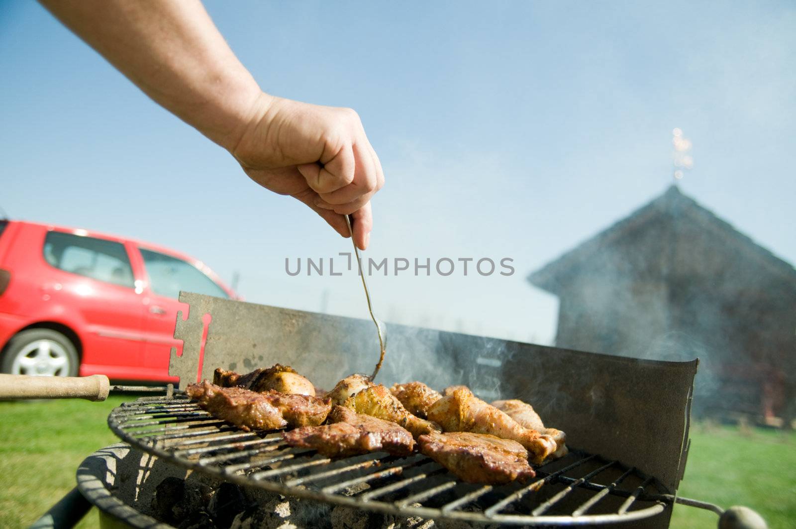 Cooking on the barbecue grill. Outdoor weekend time