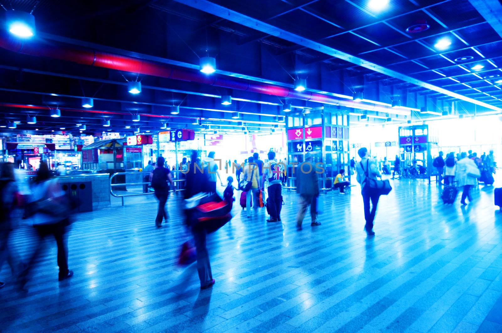 Railway station rush. People motion blur