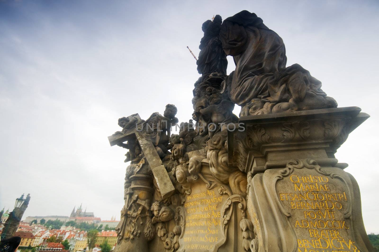 Statues on Charles Bridge and Bridge Tower in Prague.