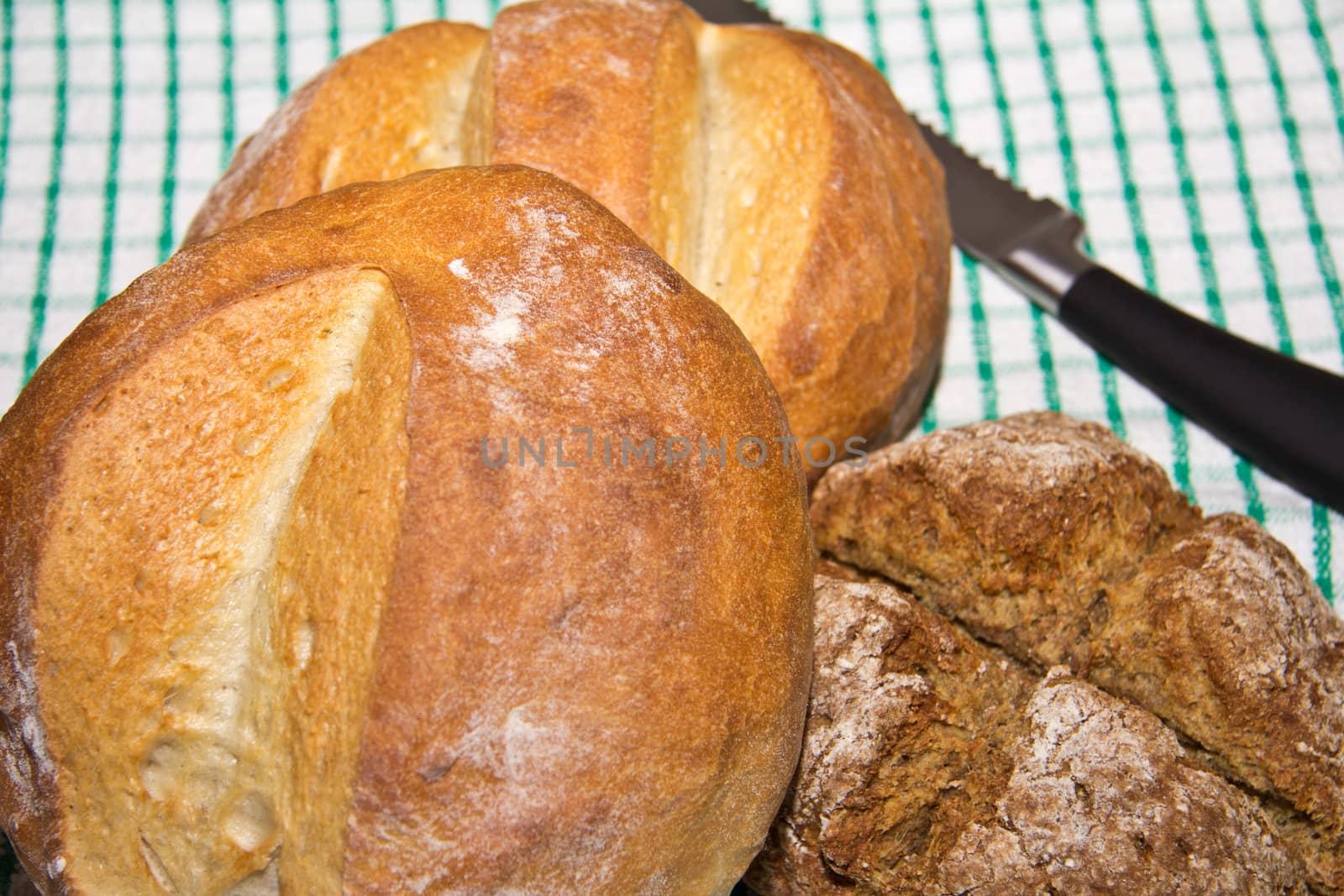 Three loaves of freshly baked bread