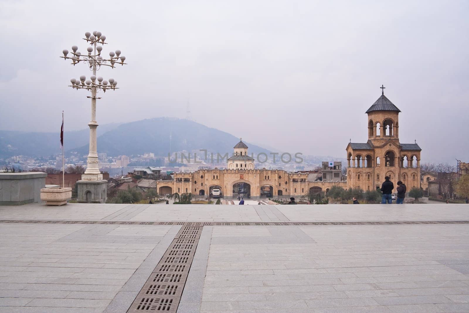 The territory of the Holy Trinity Cathedral (Tsminda Sameba): the lower church - the honor of the Annunciation and the Belfry. Tbilisi, Georgia