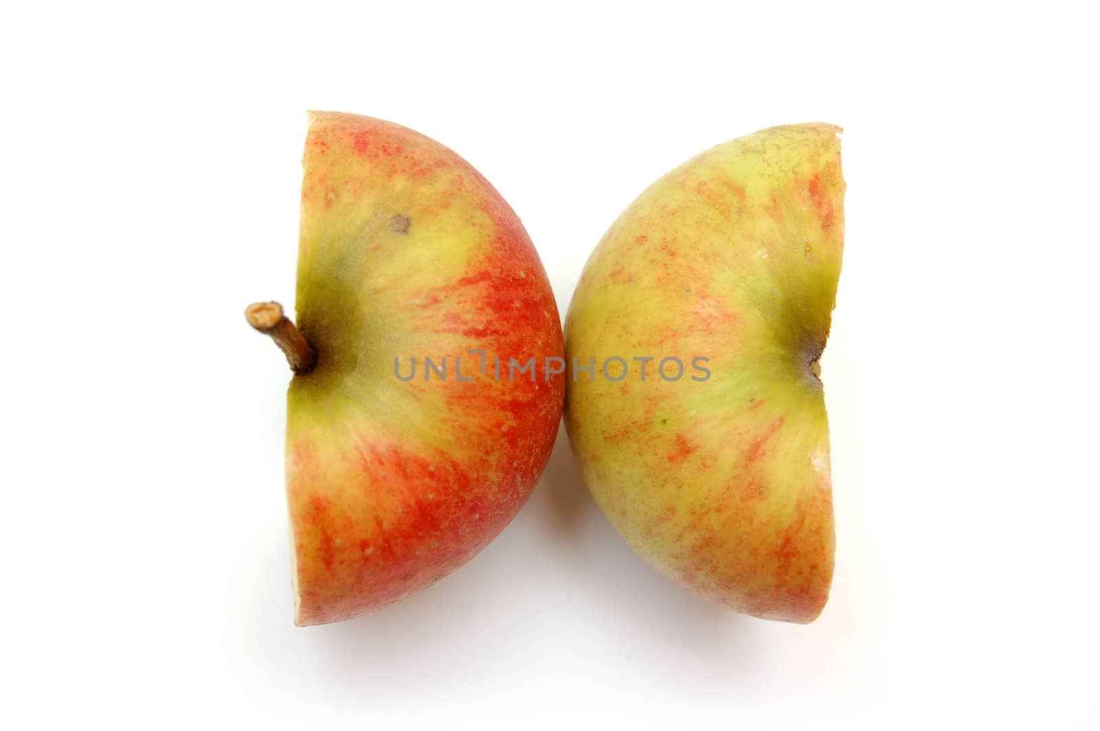 Two apple halves isolated on white