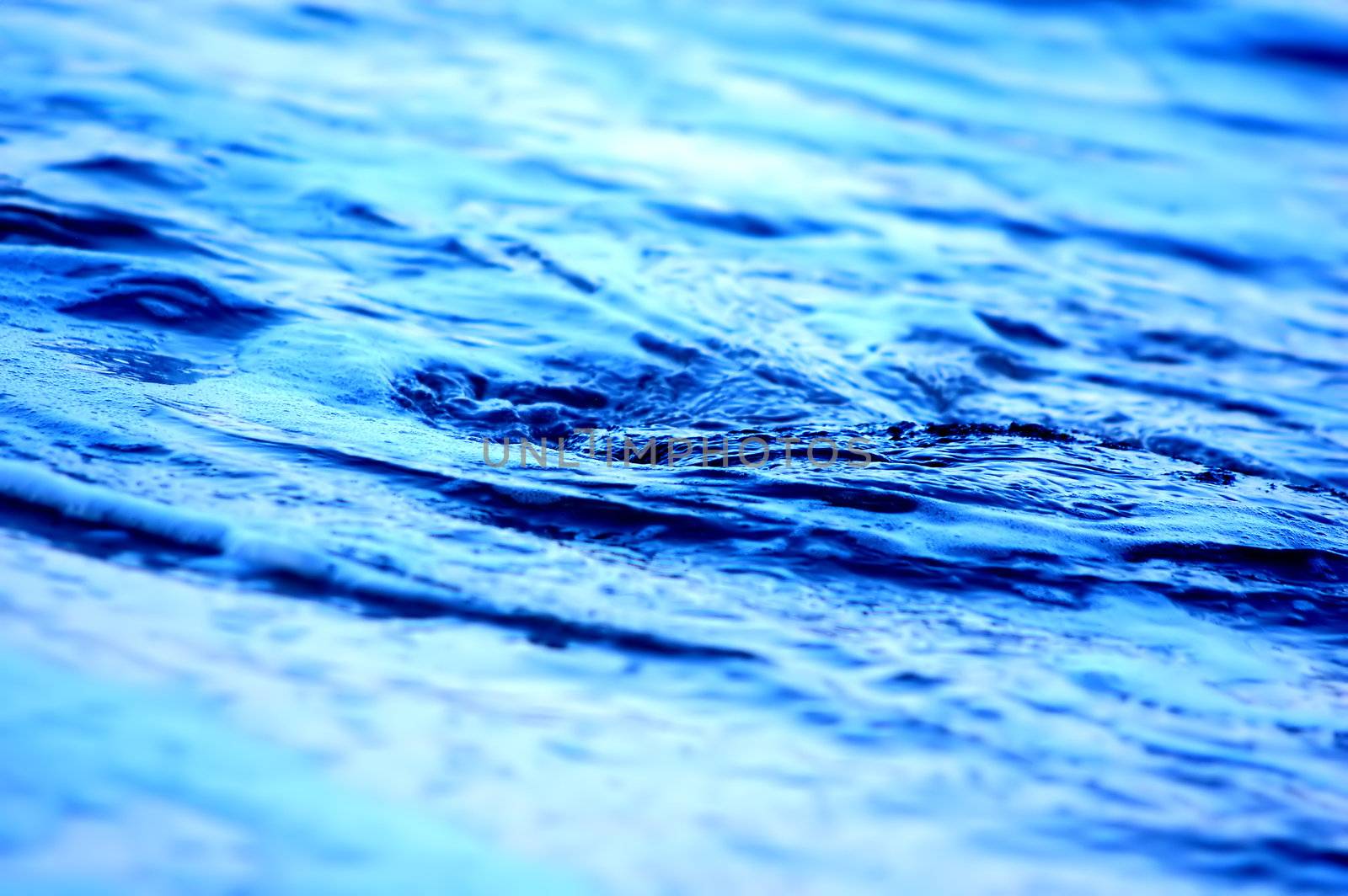 Blue, crystal water twirling, background