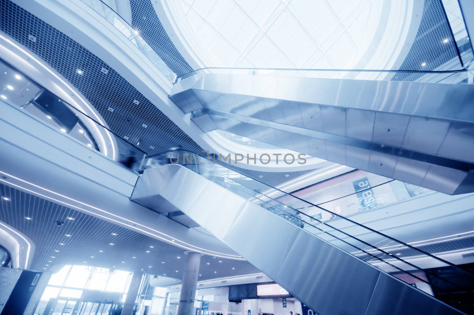 Modern shopping center. The escalators