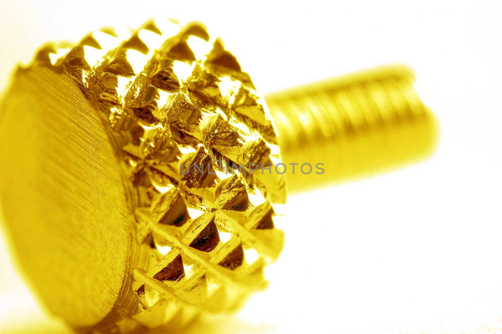 Yellow screw close-up. Conceptual image 