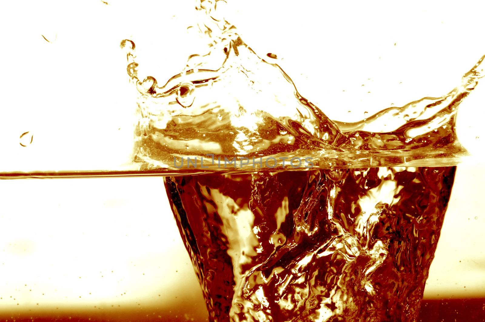 Cola splash on white background