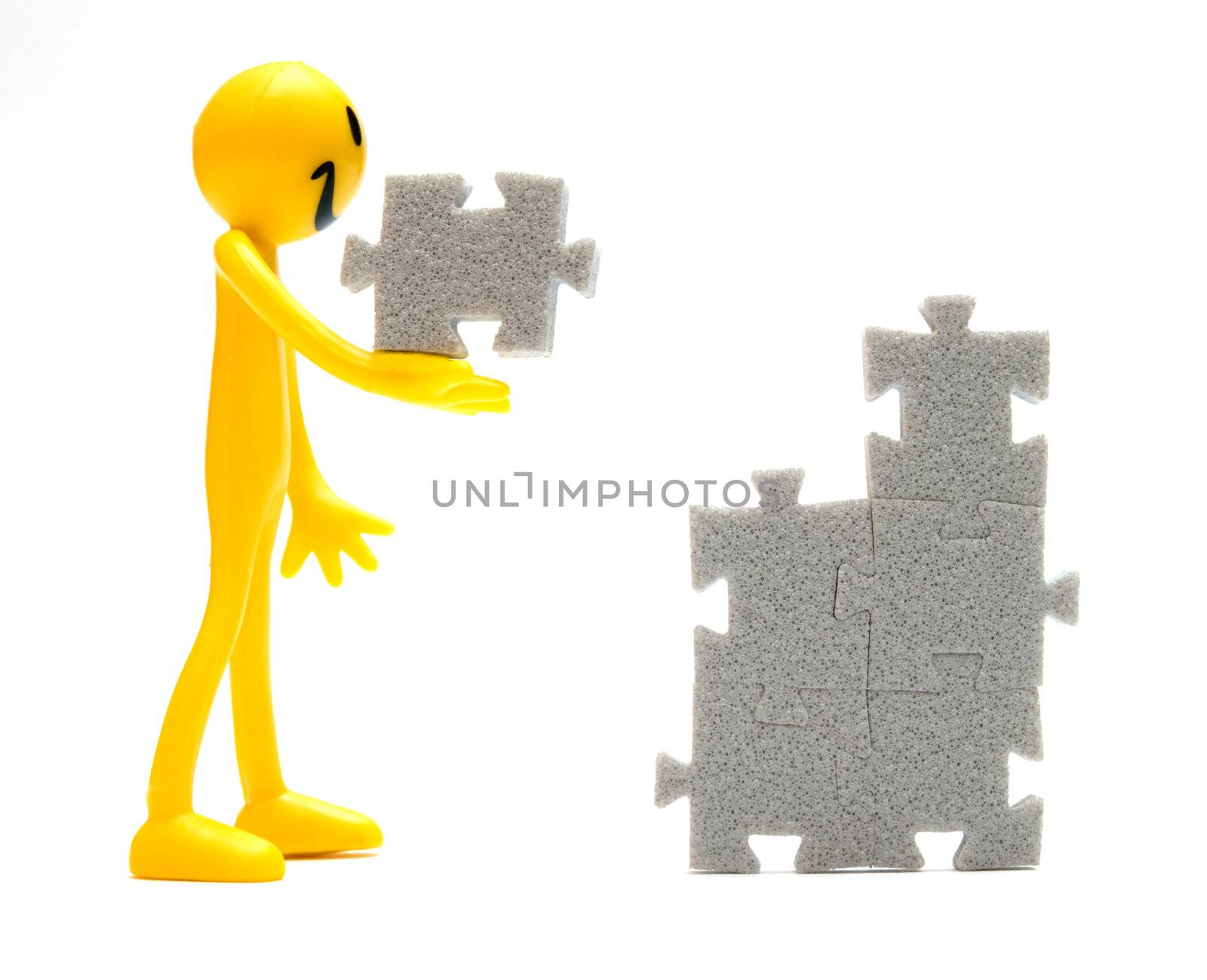 Putting pieces of puzzles together. Conceptual image