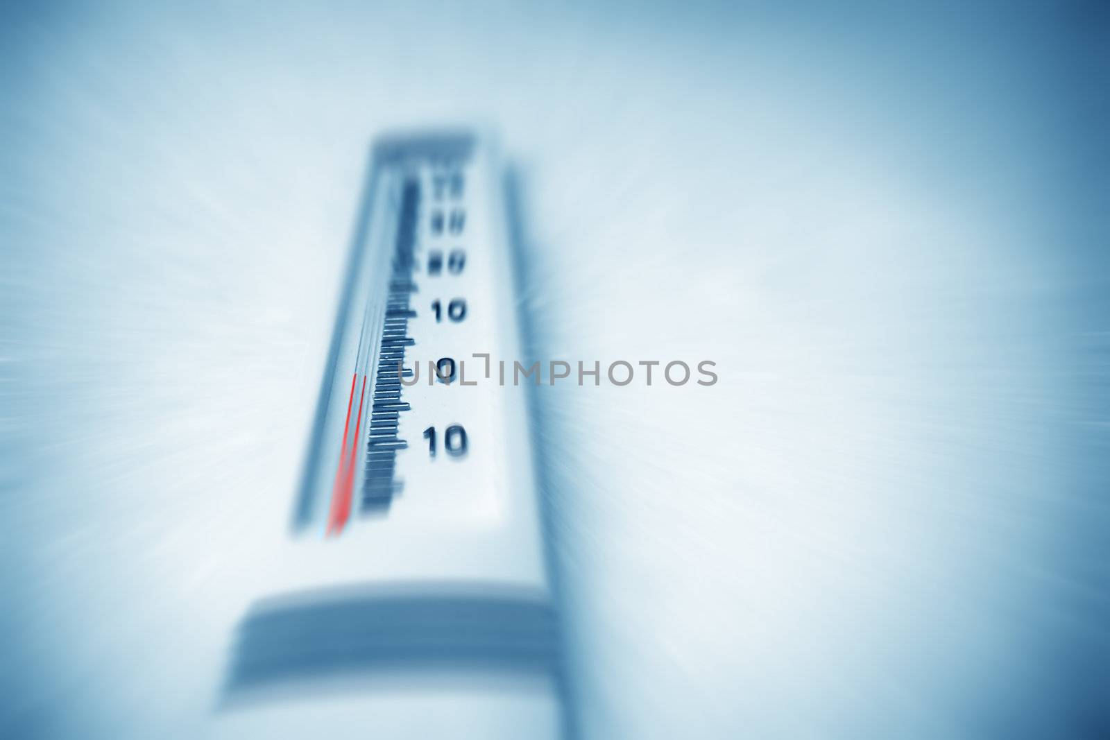 Below zero. Thermometer indicating minus temperature in cold winter.