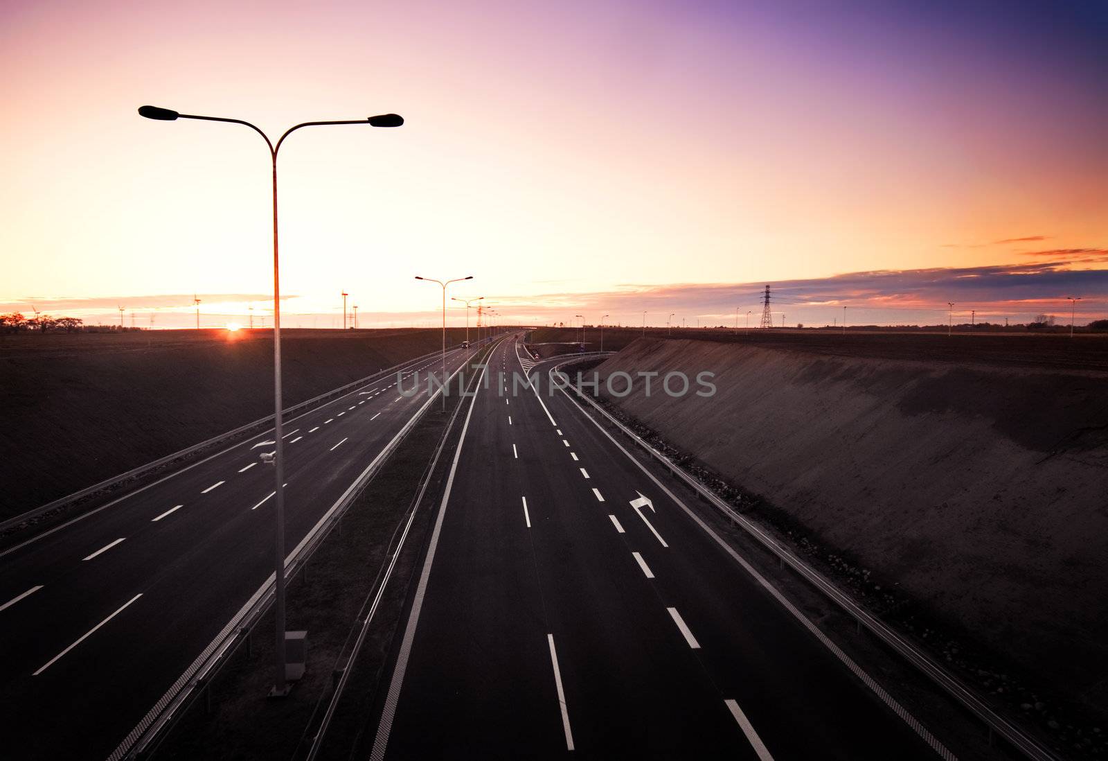 Highway at sunset. Top view