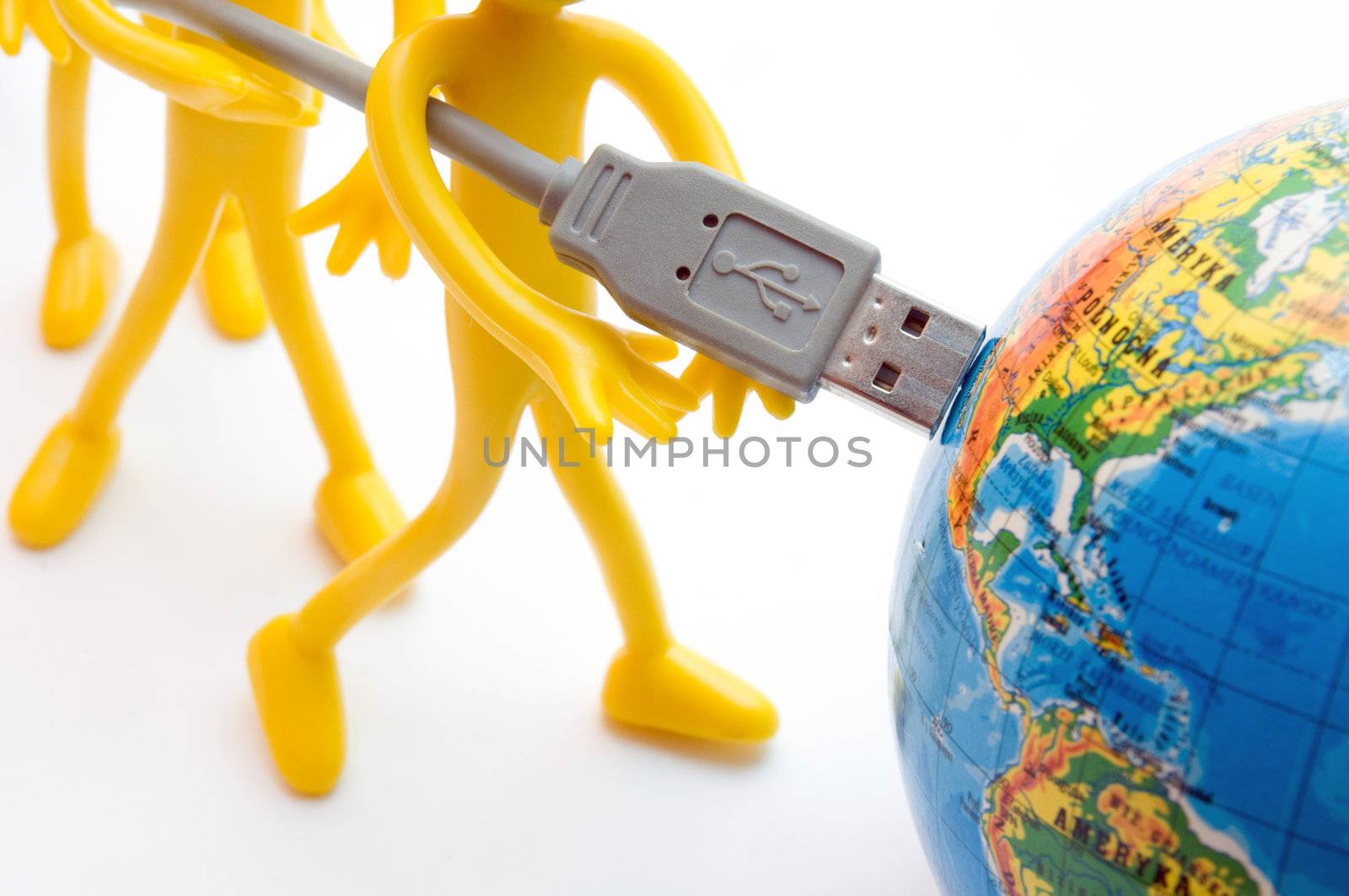 Plugging USB into earth. Global communication. Conceptual