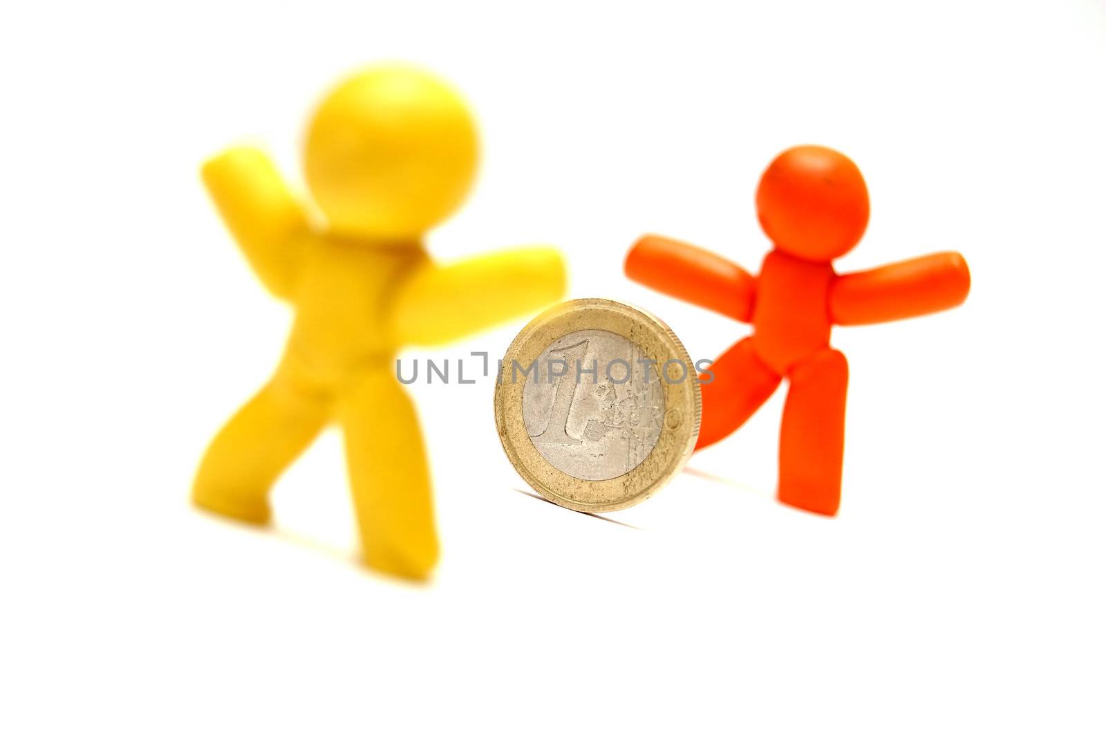 2 plasticine figures staying in front of each other. Competition in business