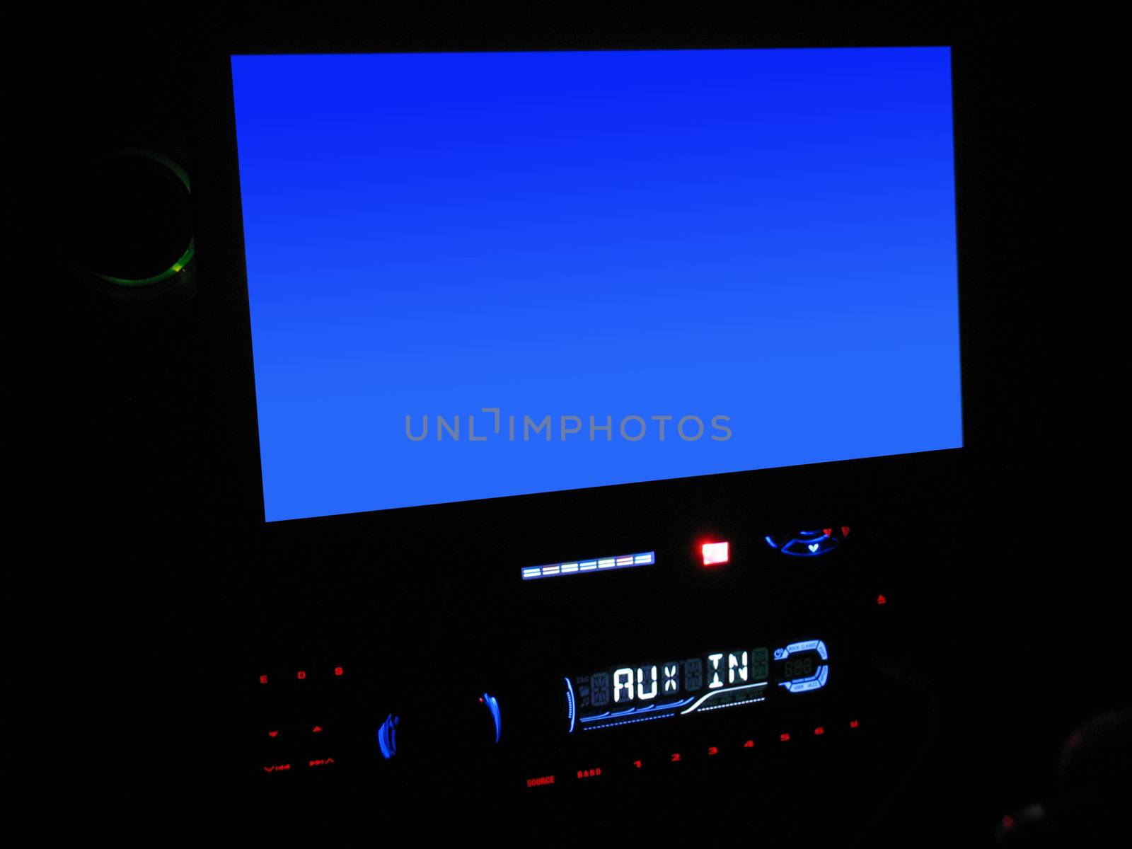 An in dash entertainment system which includes tv, dvd, and mp3 player.  

Includes CLIPPING PATH for the screen area.  Place any image you want on the screen, easily - or just leave it blue.