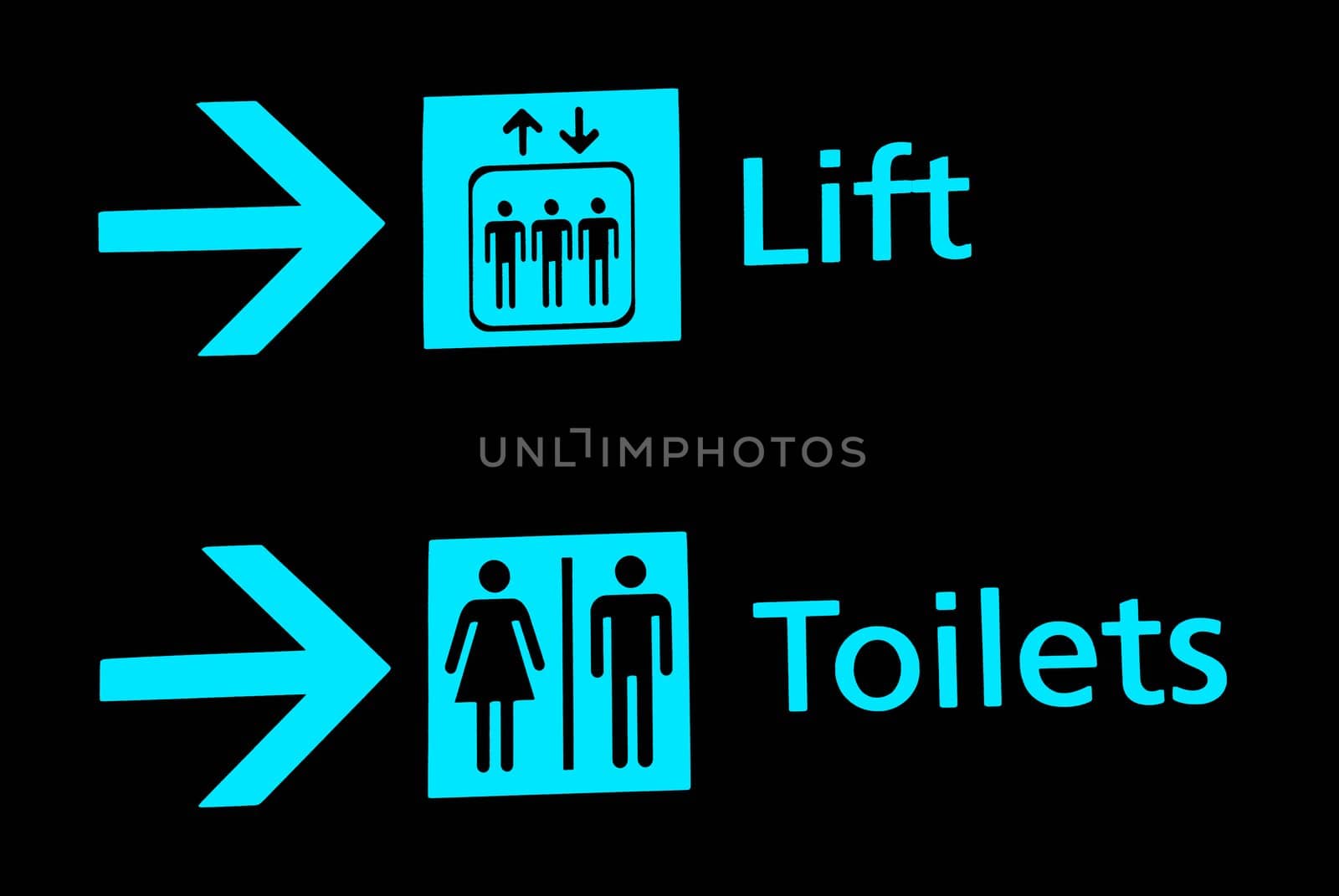 View of airport signs in black background