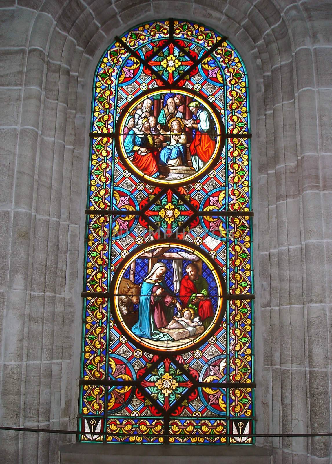Stained Glass Window Depicting Bible Stories (Munster Cathedral In Basel Switzerland).