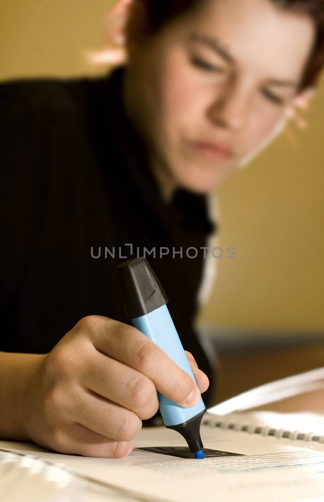 Simple non artificial shot of a student studying or doing work at home.

Shot with studio strobes indoors.