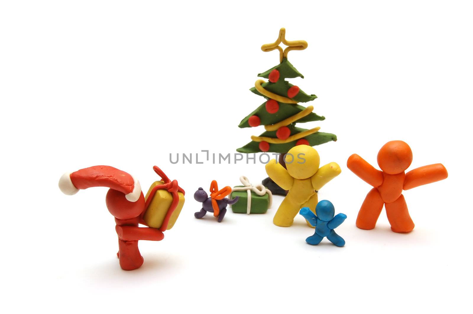 Plasticine figures staying together and celebrating christmas time, Santa Clous giving away presents