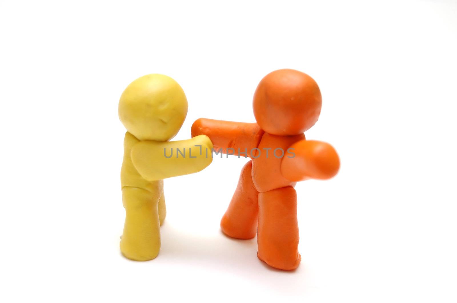 2 plasticine figures agreement and handshake