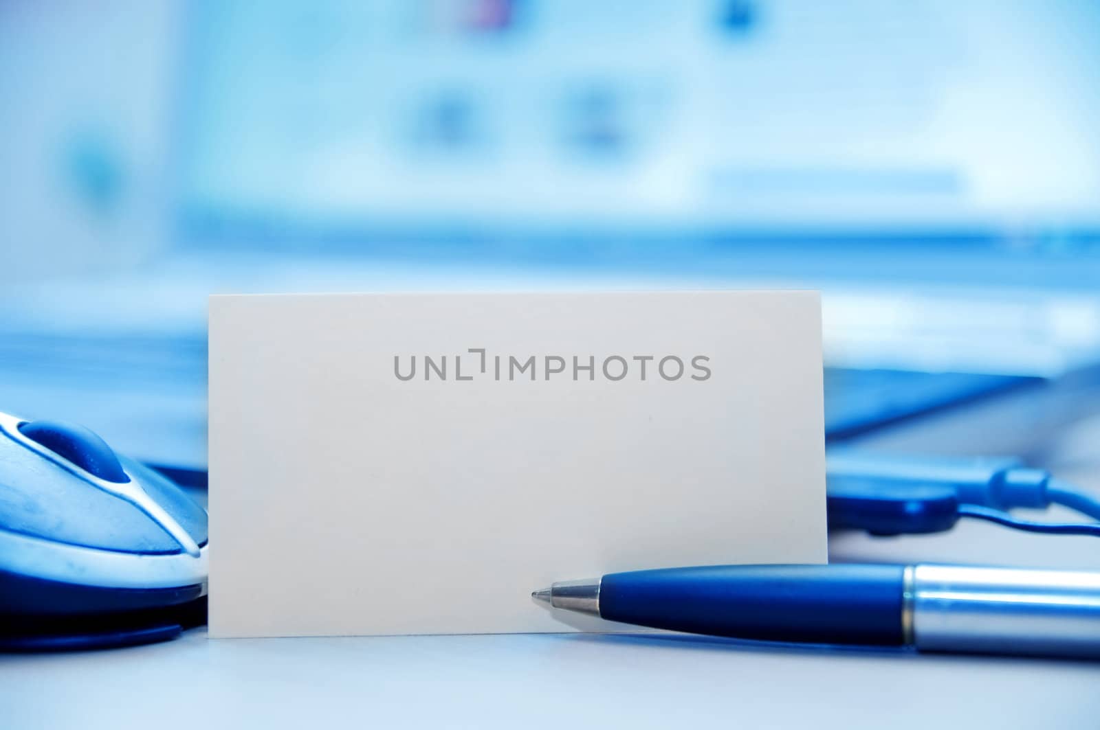Modern business workplace and blank card for message