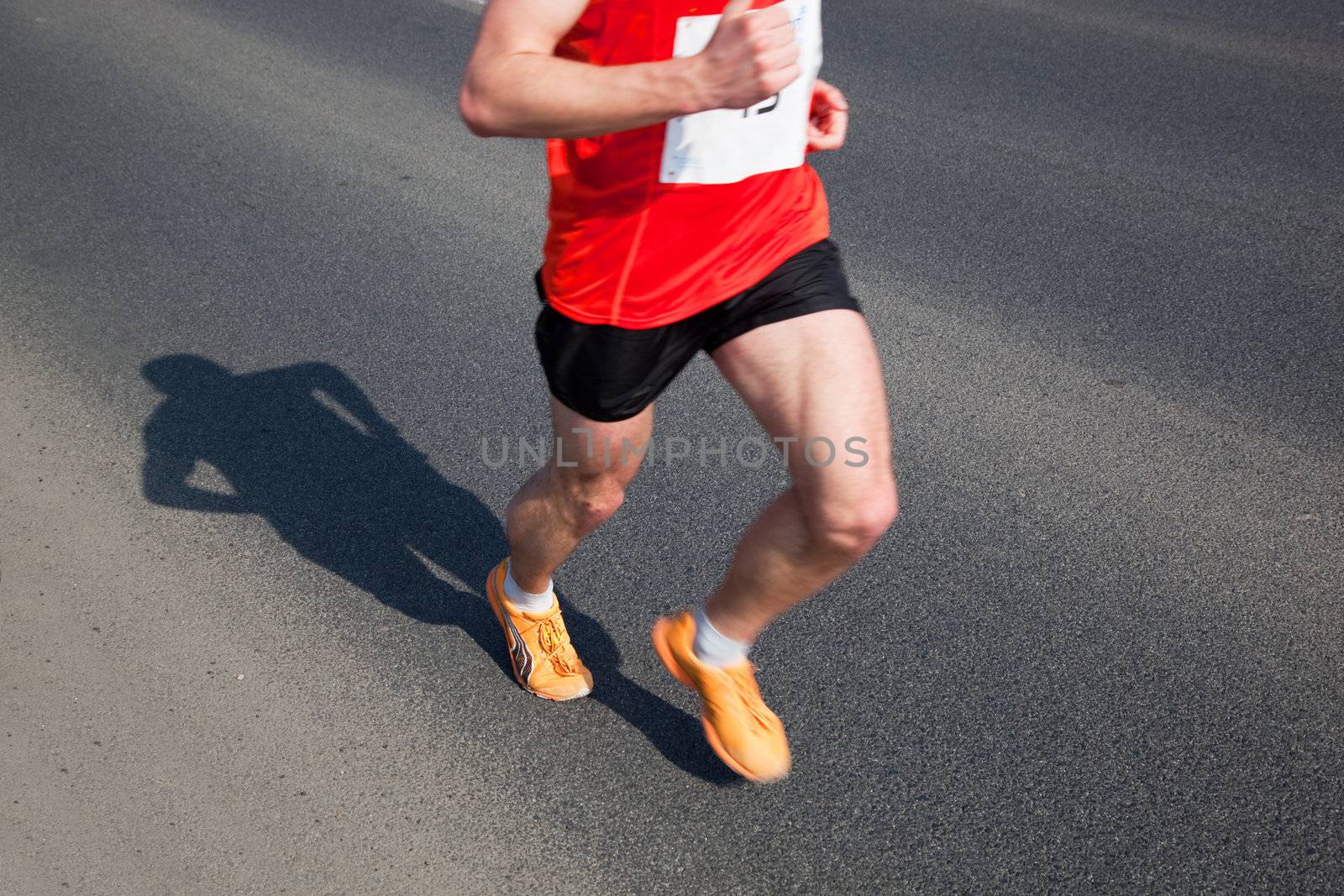 Marathon runner on the way. Running, a healthy exercise