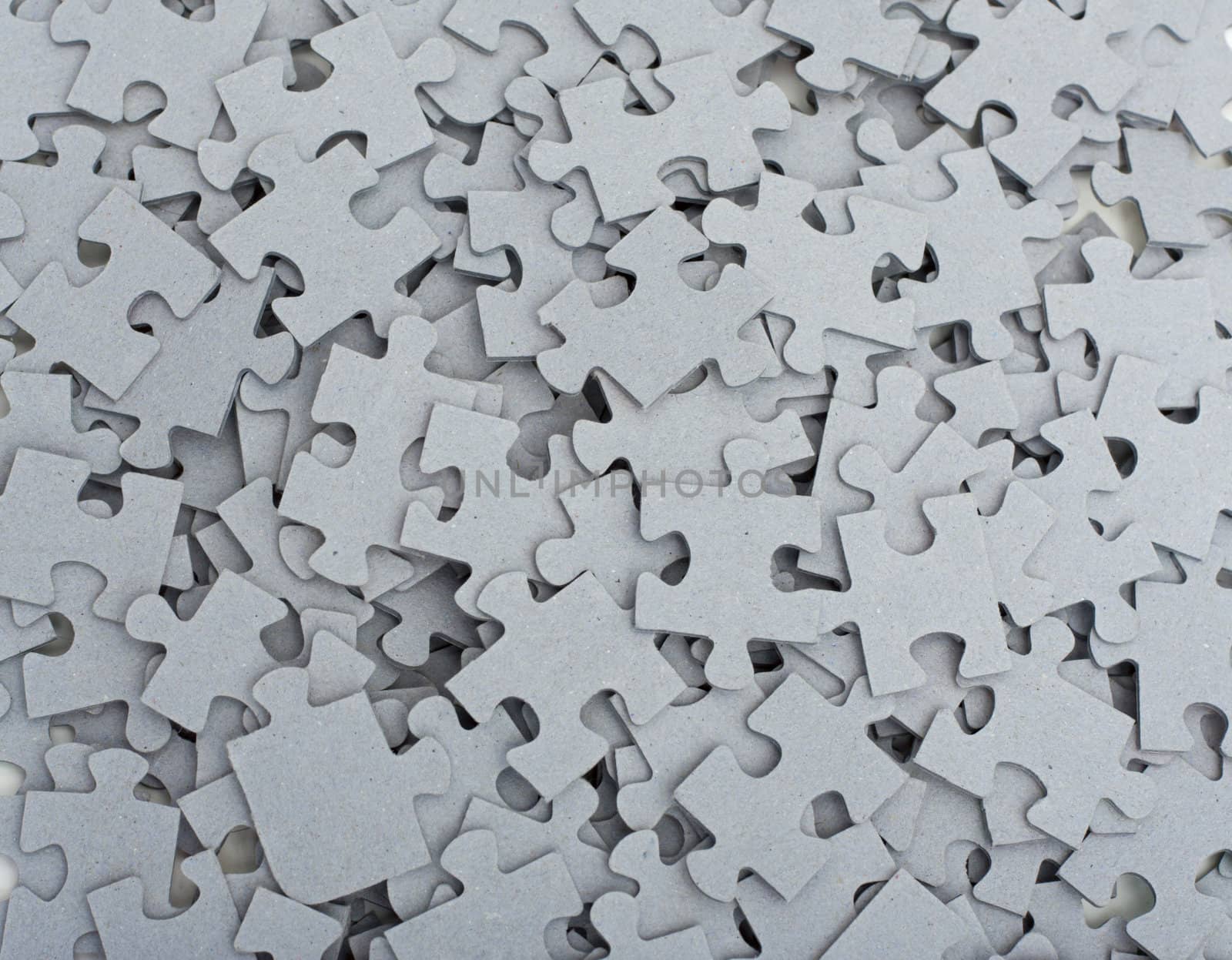 puzzle pieces close up as background