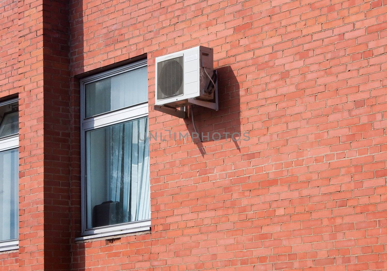 Air Conditioning on a brick wall