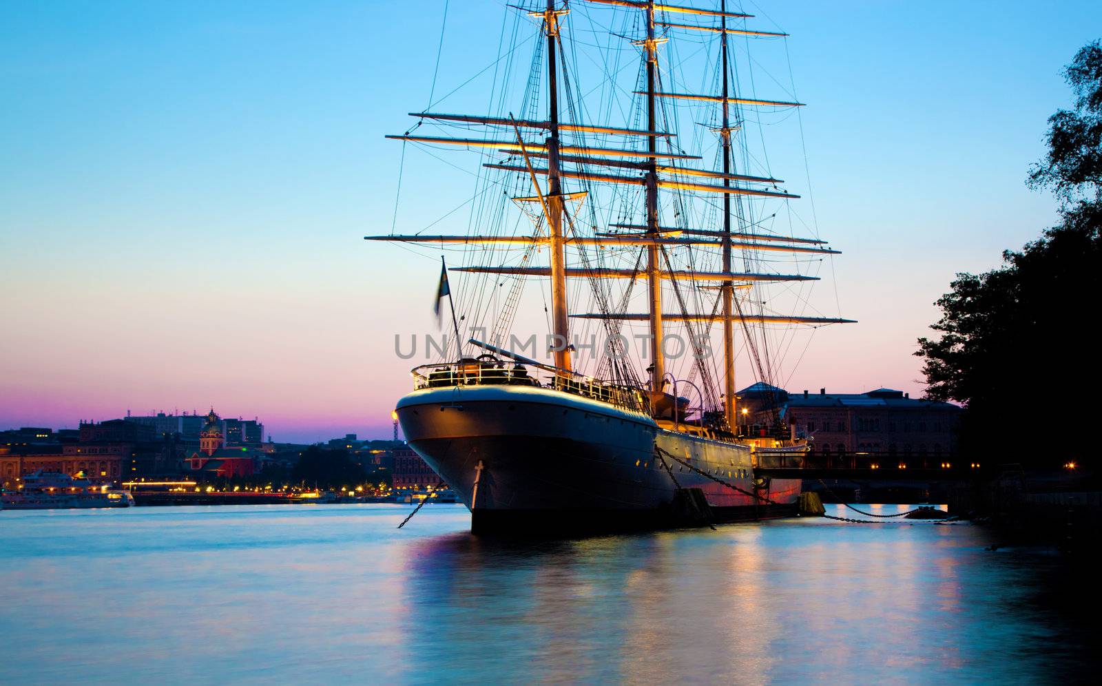Ship at sunset, Stockholm, Sweden. Romantic view on the city