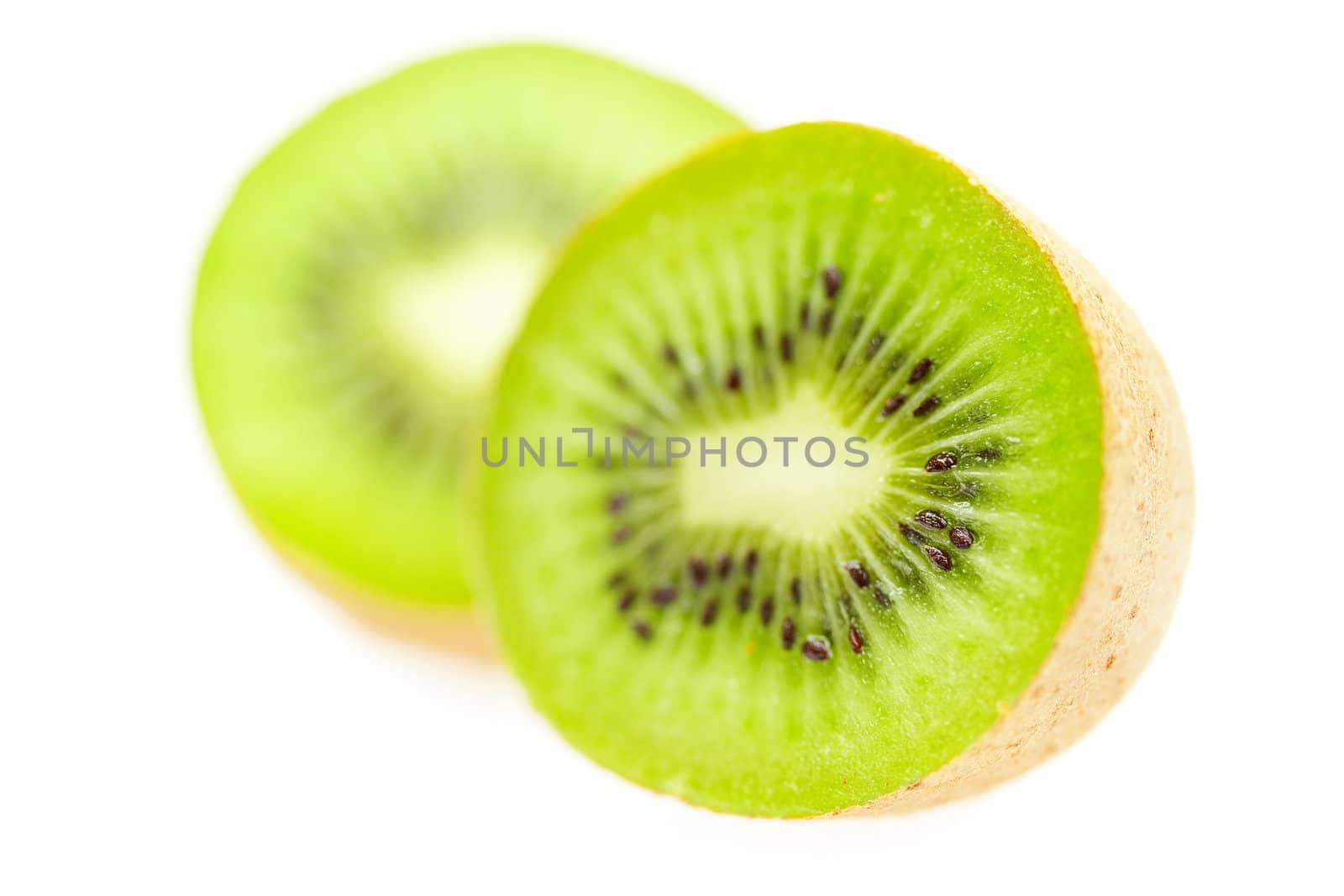 juicy kiwi isolated on white by jannyjus