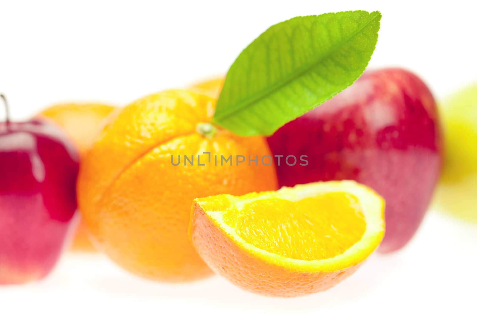 oranges and apples  isolated on white