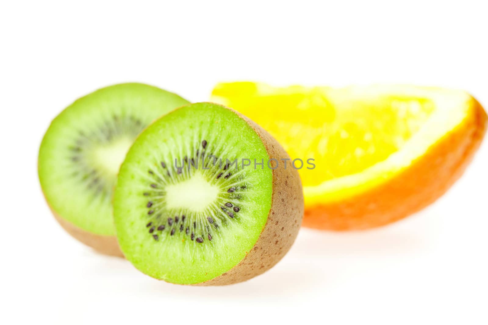 juicy kiwi and oranges isolated on white by jannyjus