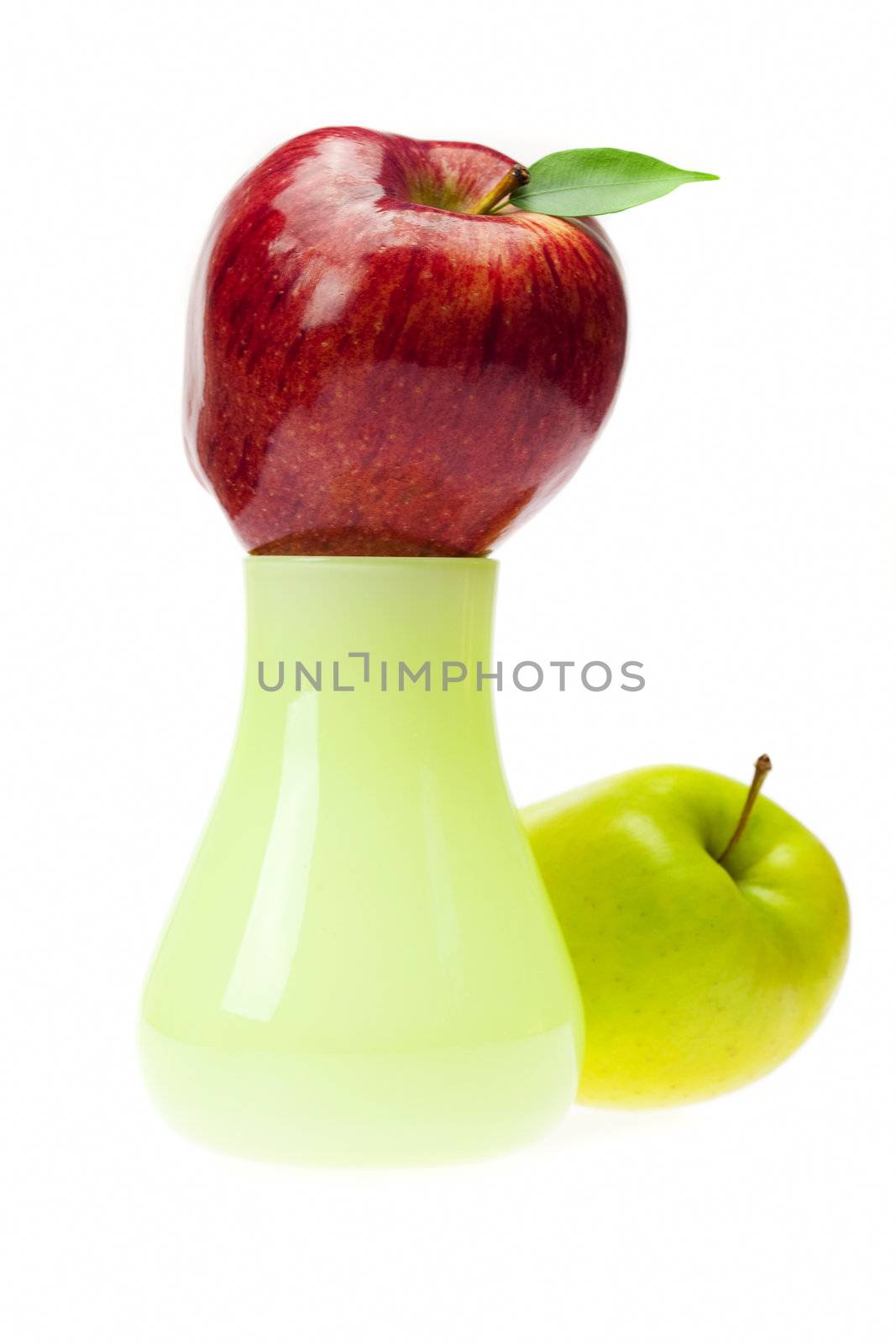 apples in the vase isolated on white