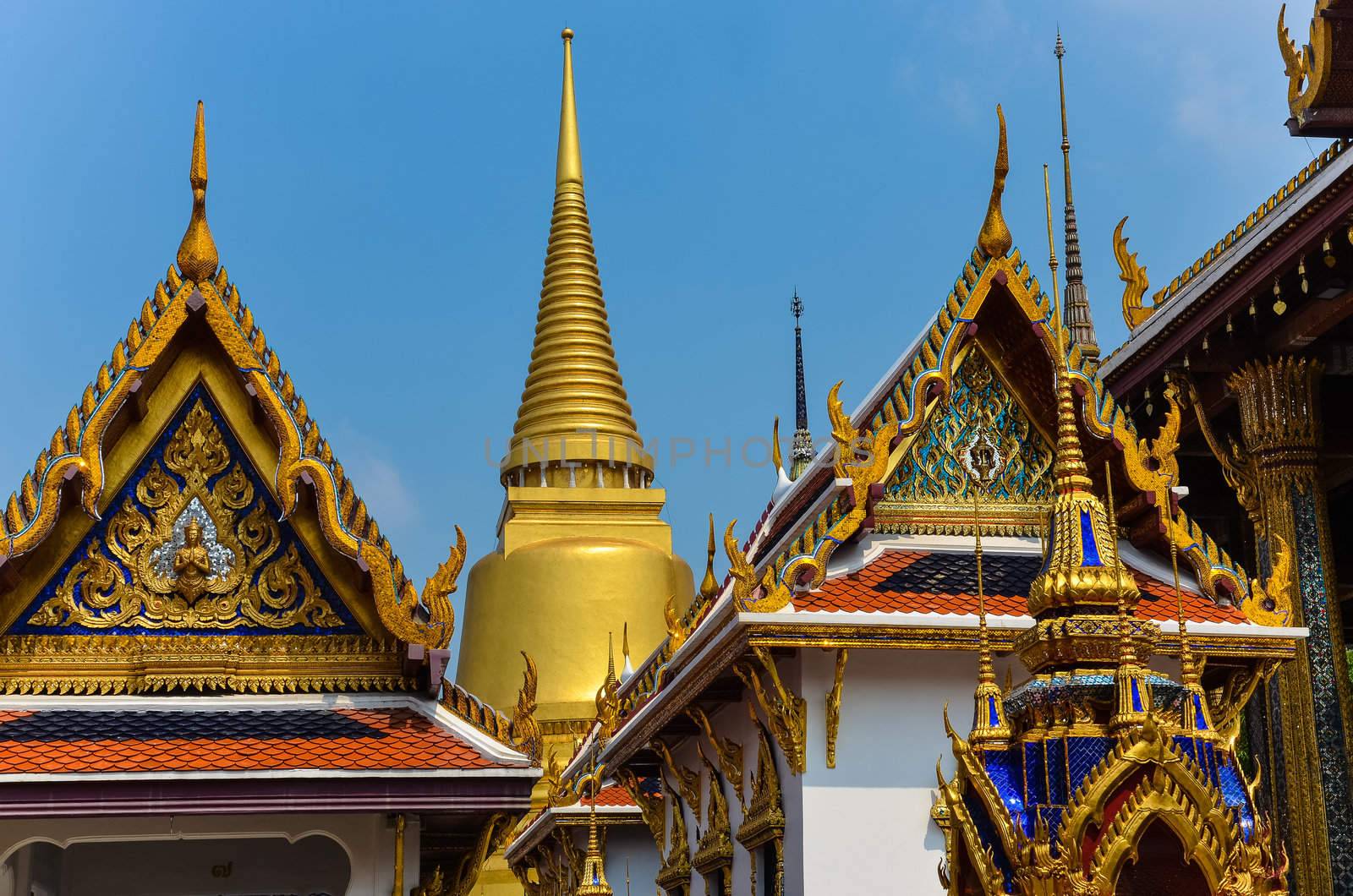 Detail of ornament and golden roofs in Grand palace, Bangkok by martinm303