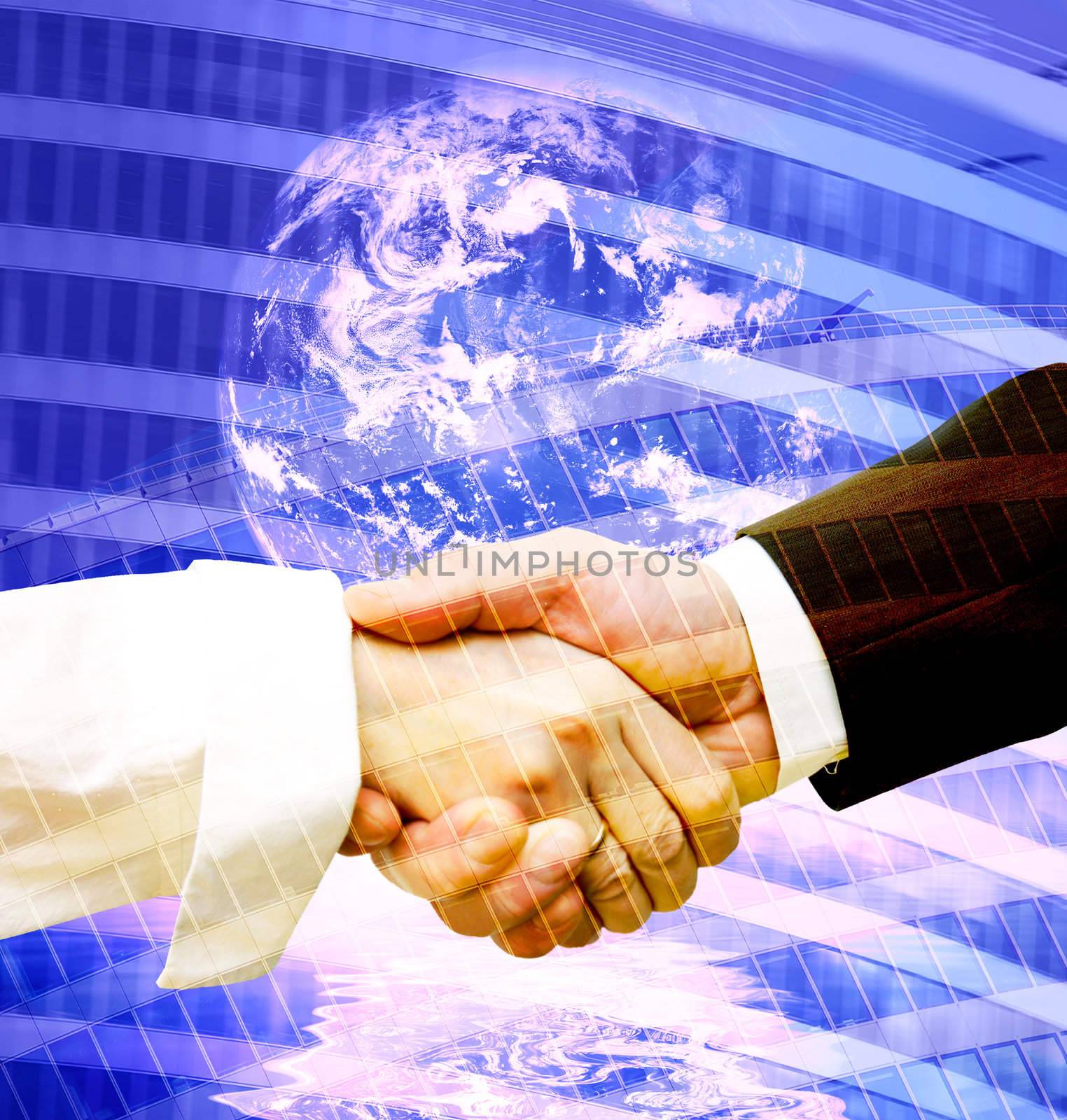 Business handshake on modern background