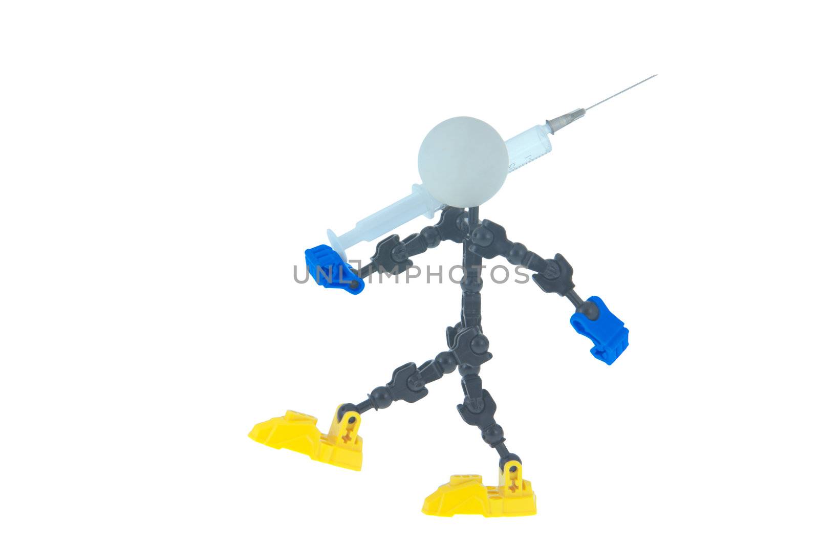 robot toy marching and on shoulder keeps medical syringe isolated on white