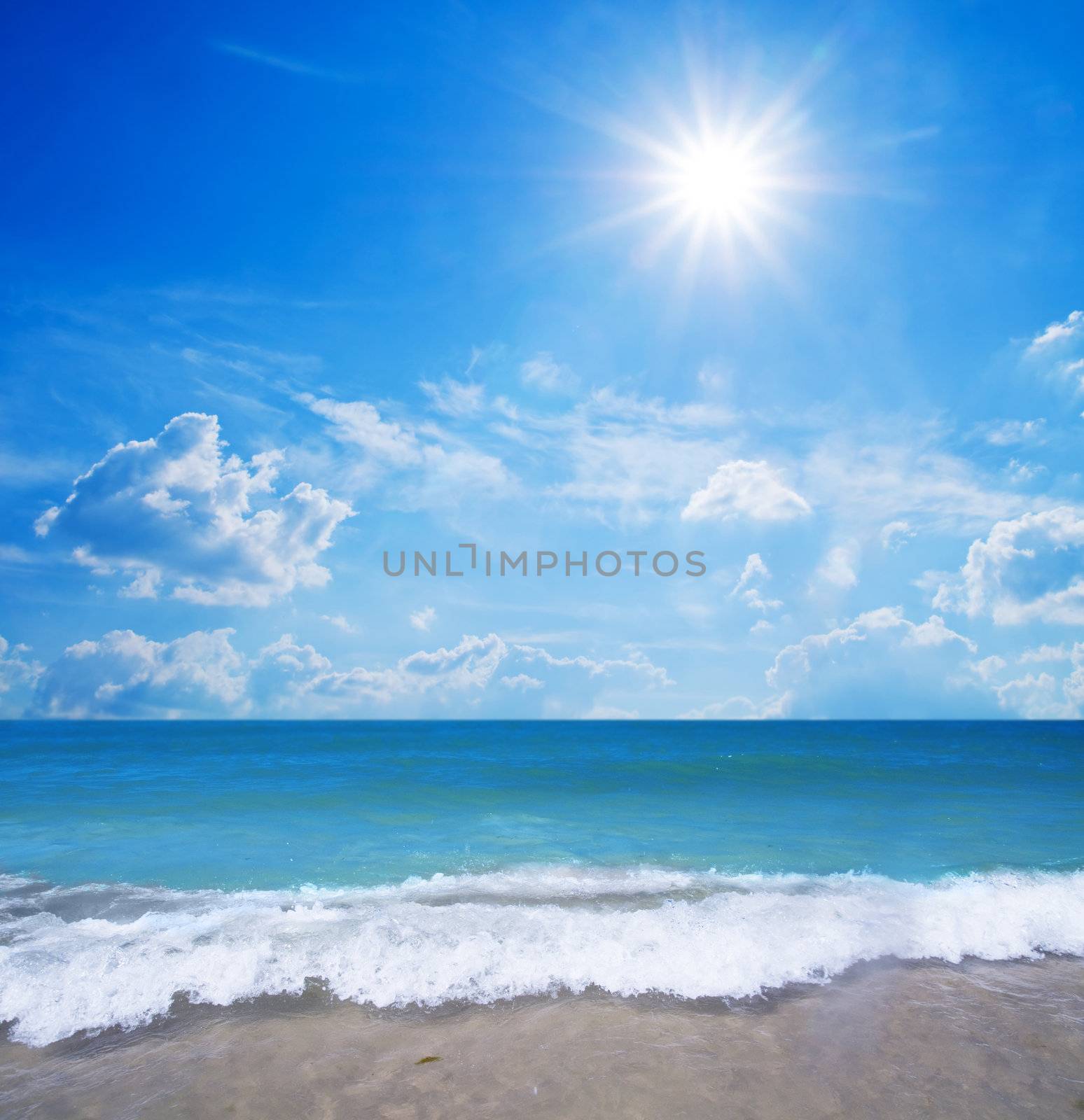 Tropical beach, sunny blue sky