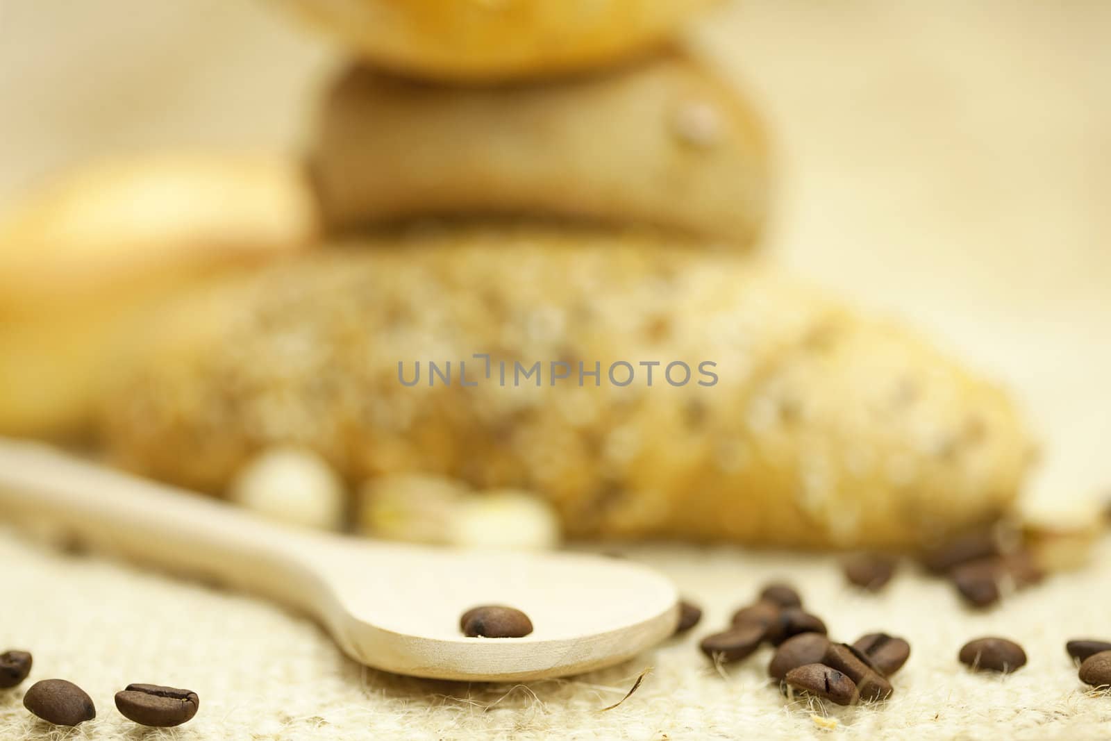 bread and coffee on a wicker mat by jannyjus