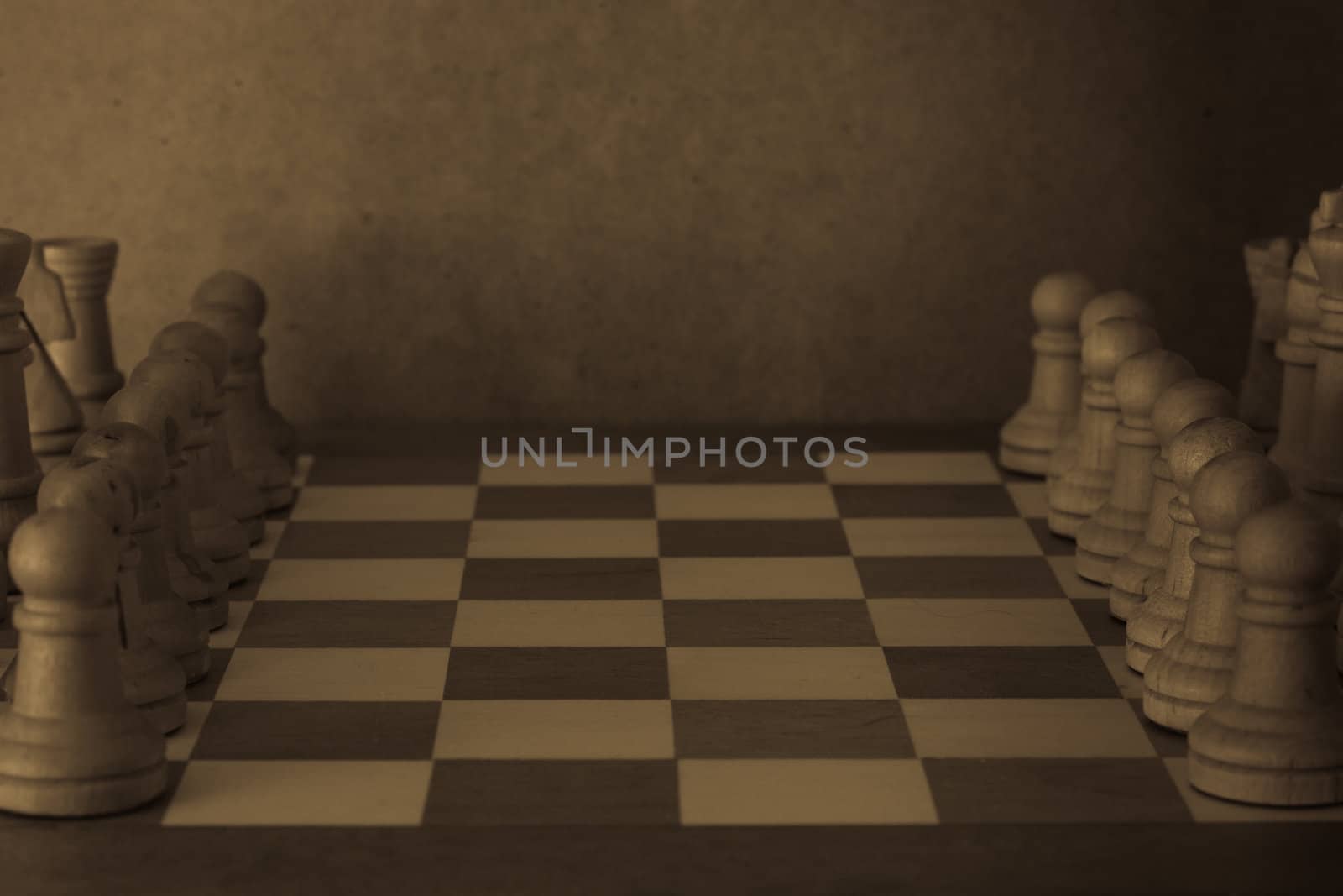 A black and white image of an old chess set