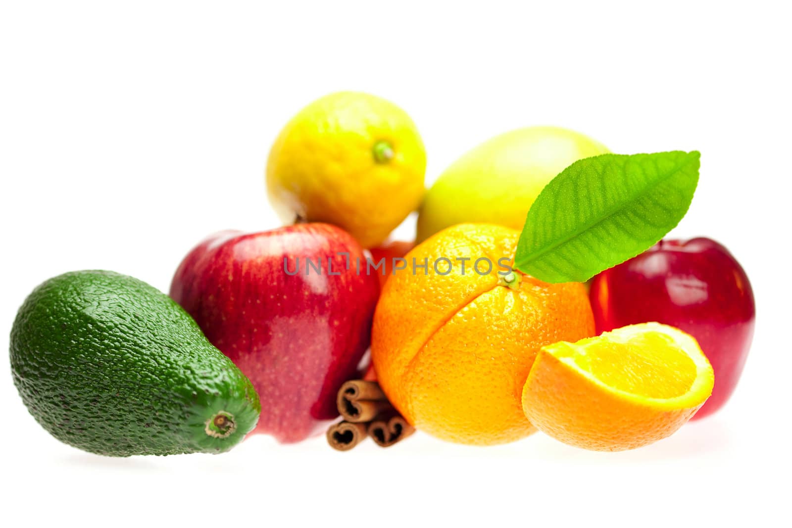 avocado, apple, orange, lemon, and cinnamon, isolated on white by jannyjus